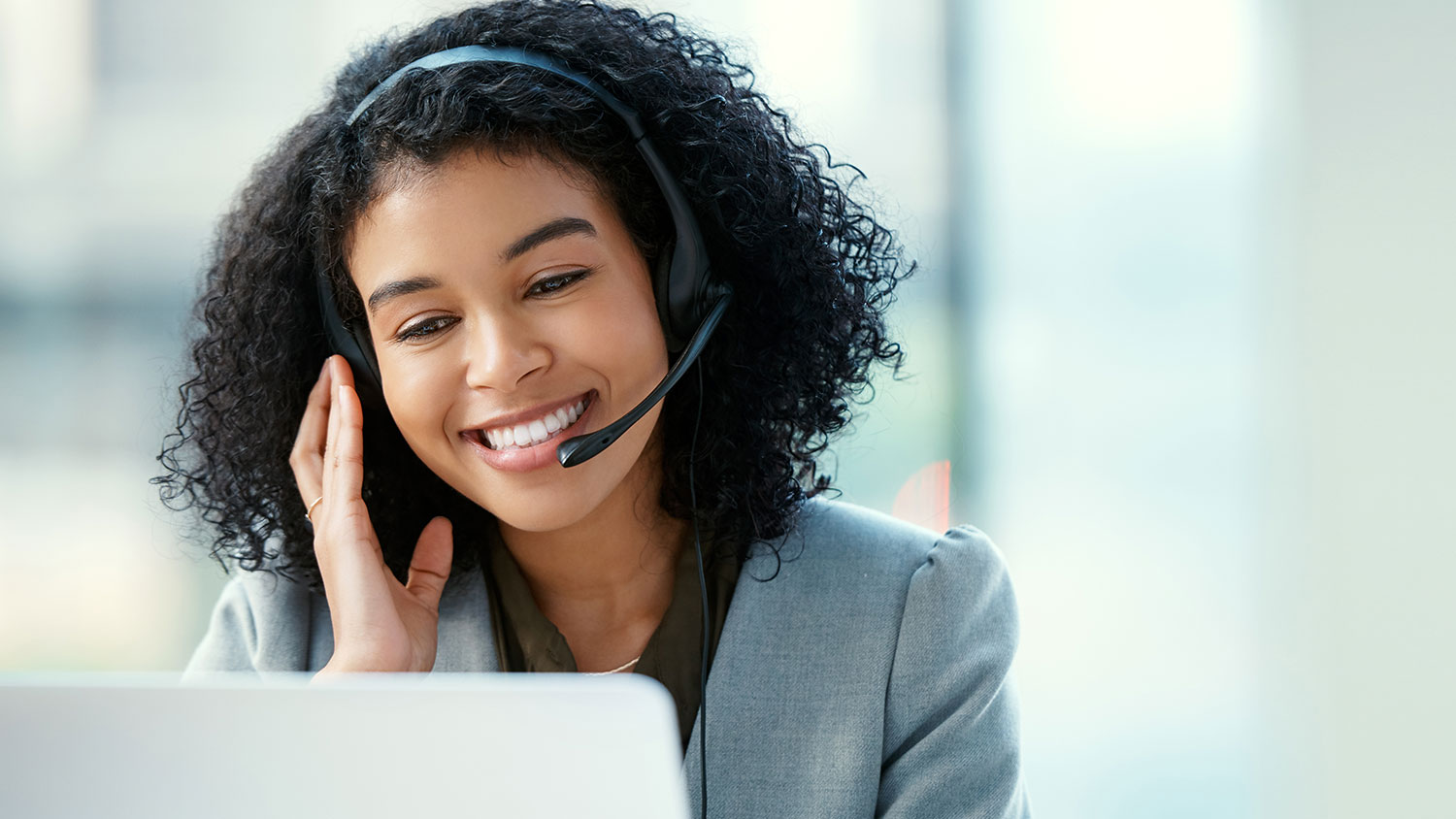 Image of a woman talking on the phone