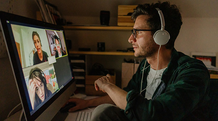 male working from home in a microsoft teams video call